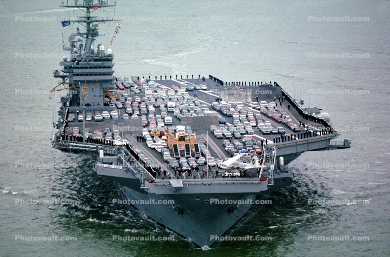 Loaded with cars, moving to new Navy Base, USS Carl Vinson, CVN-70