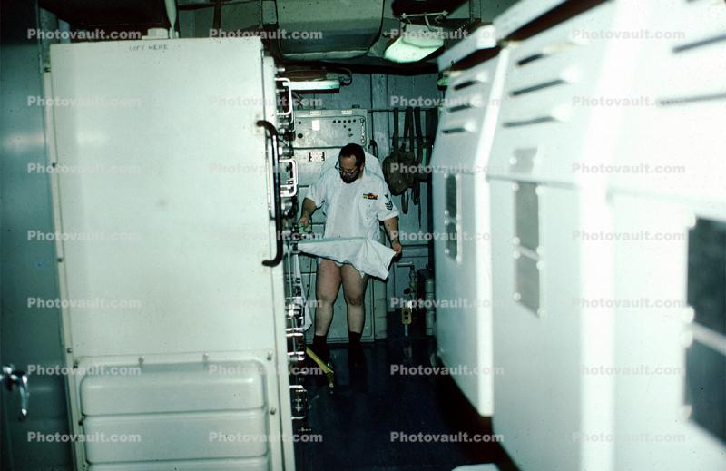 laundry room, sailors onboard ship, October 1976