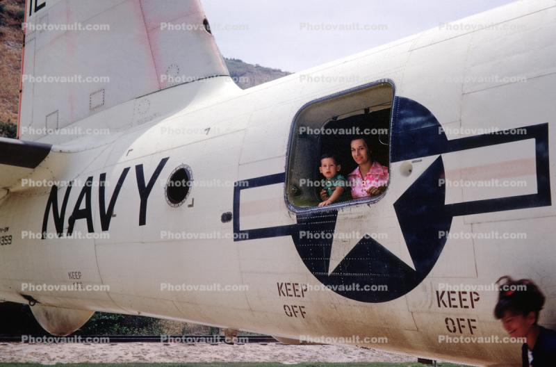 Mother and Son in the window of a P2V Neptune