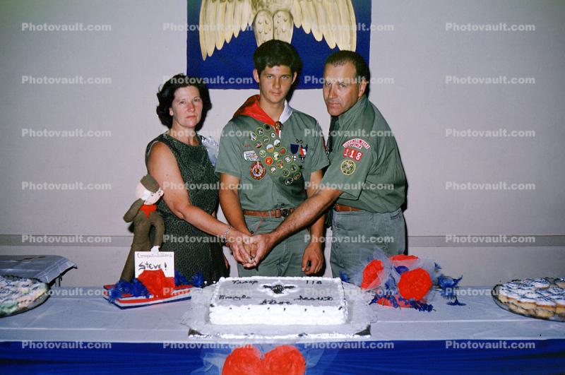 Boy Scout, birthday, cake cutting, man, woman, mother, Father