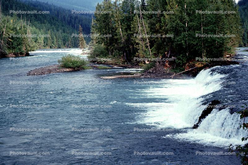 Waterfalls emptying Clearwater Lake into Clearwater River