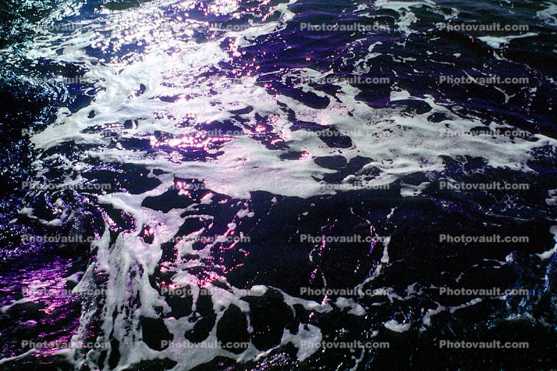 Purple swirls of water