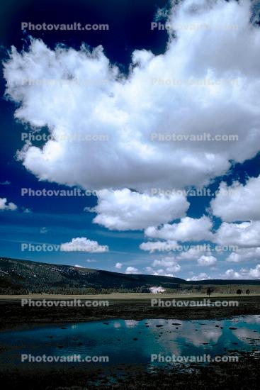 Clouds, cumulus, reflection, mountains