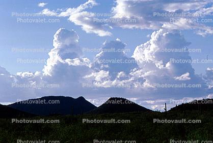 Cumulus Clouds and a Mountain Range