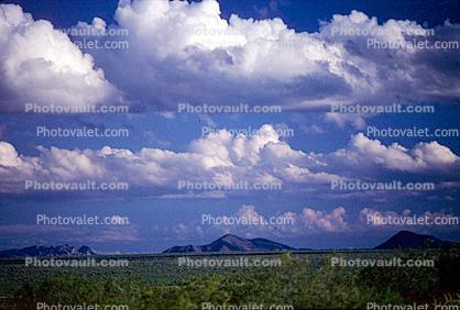 Cumulus Clouds and Mountain Ranges