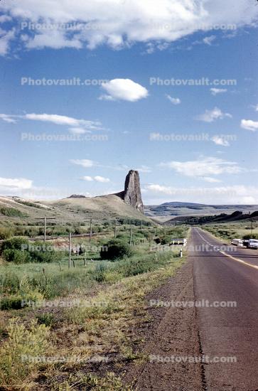 Outcropping, volcanic throat, road, highway, butte