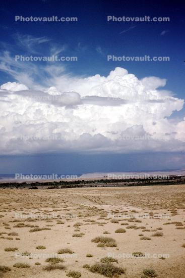clouds, sandy desert