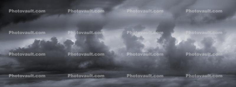 Three Columns, gray clouds, landscape