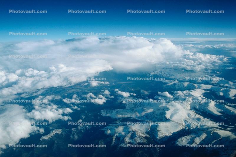 snowy mountains, daytime, daylight, cumulus clouds