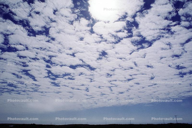 Sun pearing through Altocumulus Clouds, daytime, daylight, fractals