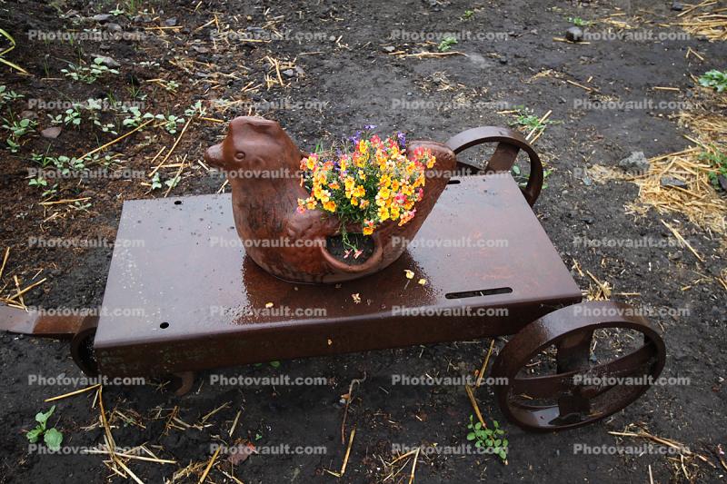 Flower Pot, rusty cart in the rain, wet