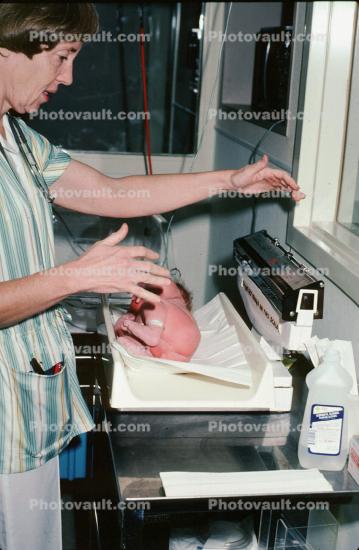 Nurse Weighing Baby, Newborn Baby, Weight Scale, 1960s, Childbirth