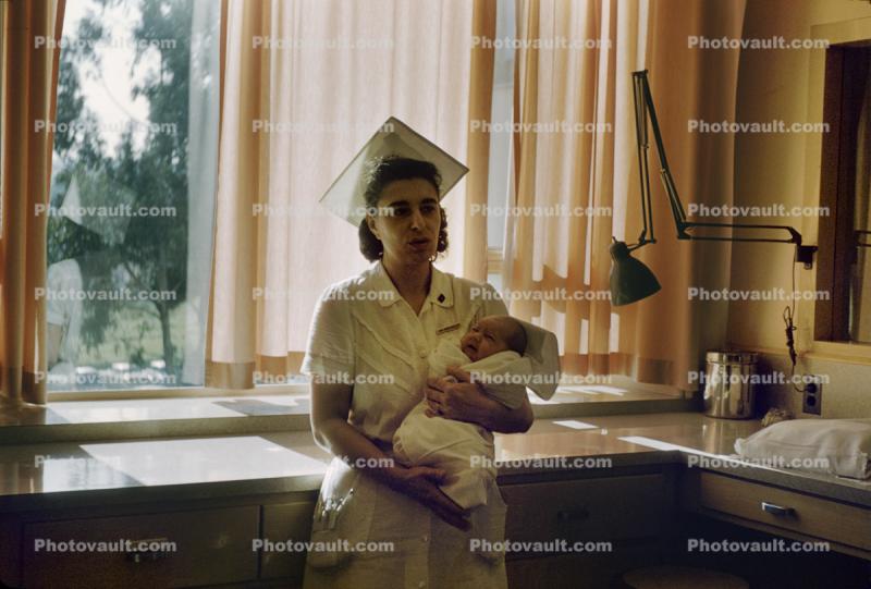 Nurse with Newborn Baby, Hospital, 1950s, Childbirth