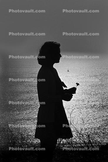 Girl Standing with flower over the Palisades Cliffs