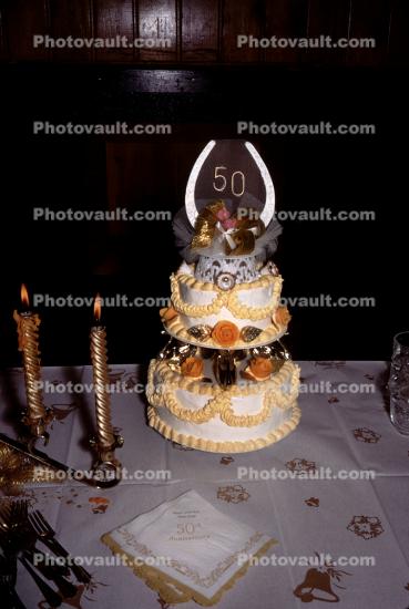 50th Anniversary Cake, candles, trimings, napkins, tablecloth