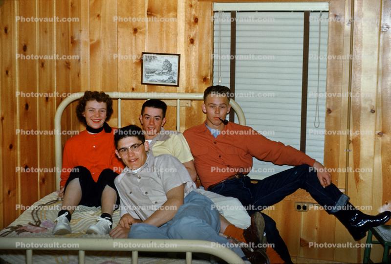 Slumber Party, men, women, jeans, wood paneling, pipe, 1950s