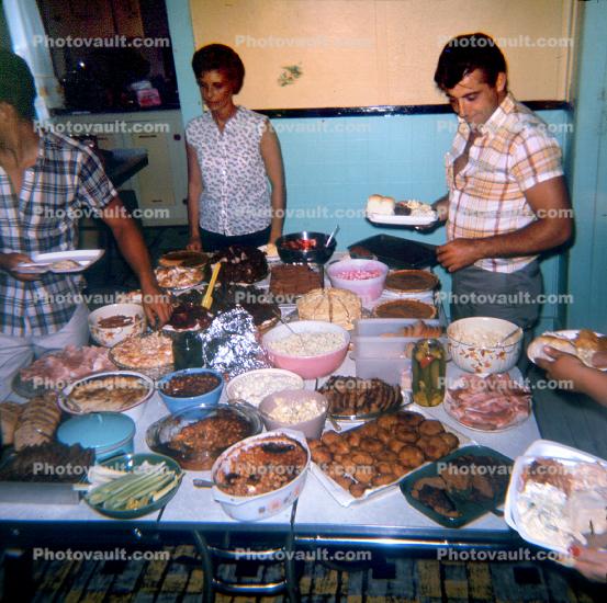 Family Eating Dinner buffet style, 1960s