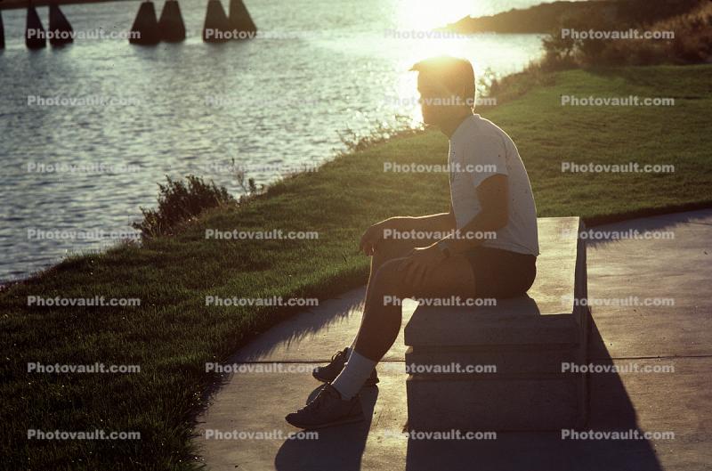 Man Sitting on a Park Bench in Burlingame