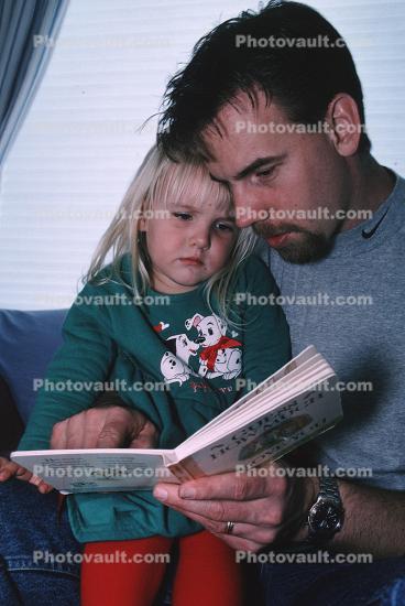 Father, Daughter, reading a book