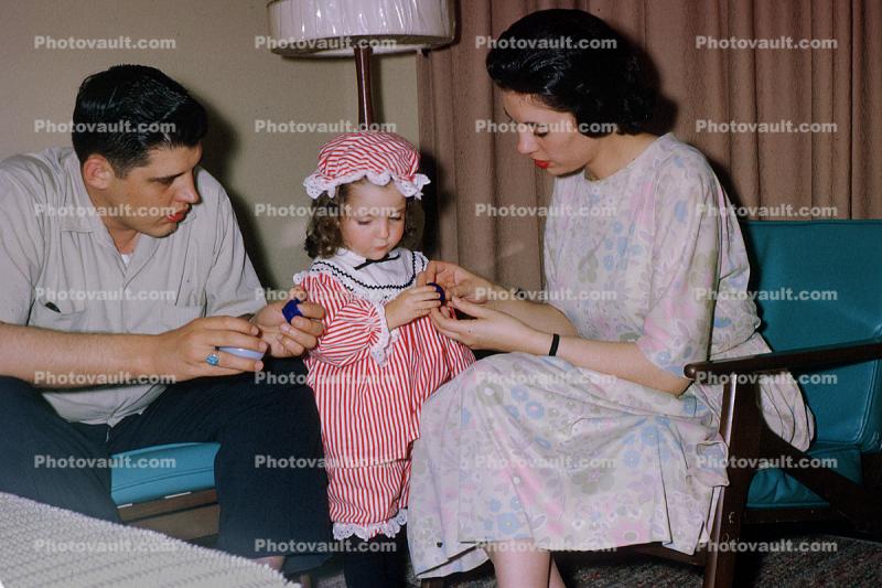 Girl, mother, father, daughter, Playing Dress up, August 1964, 1960s