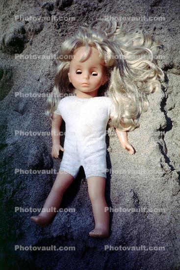 Sleeping Doll in the Sand