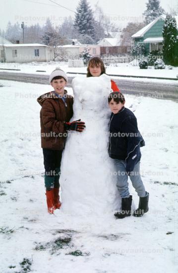 Girl, Boys, sister, siblings, brother, snowman, ice, cold, suburbia