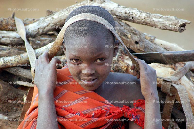 girl, headband, Child-Labor, Firewood, deforestation, desertification, Maasai village, Tanzania