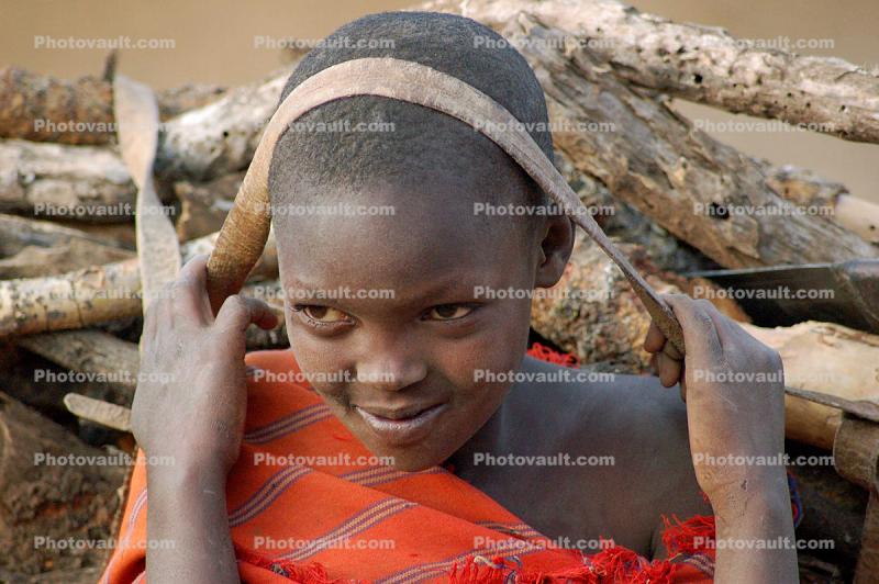 girl, headband, Child-Labor, Firewood, deforestation, desertification, Maasai village, Tanzania