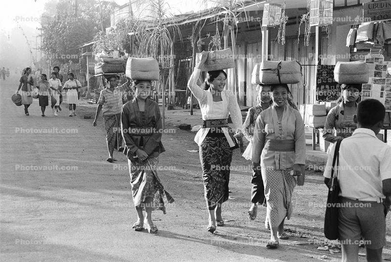 Women Walking down the street, Ubud, Bali, Indonesia