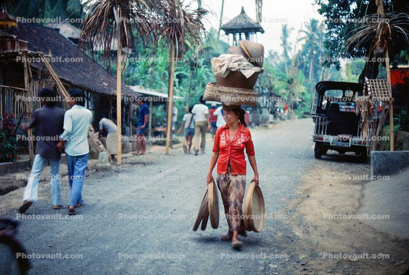 Woman, street, baskets, Ubud, Bali, Indonesia