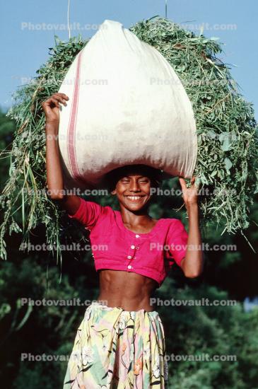 Girl Carrying a bushel, Child-Labor