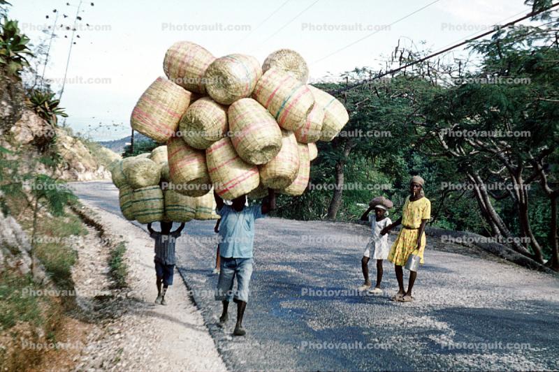 Man and Boy carrying baskets, overload, Haiti