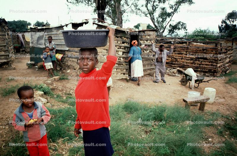 Boy Carries a Bucket, Manzini Swaziland