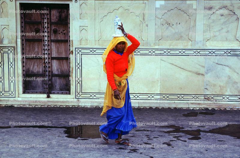 Woman Carrying a Bottle on her Head, Jaipur, Rajastan, India