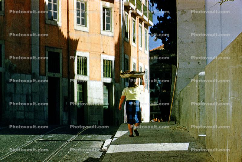 Woman, Buildings, sidewalk, rail, 1950s
