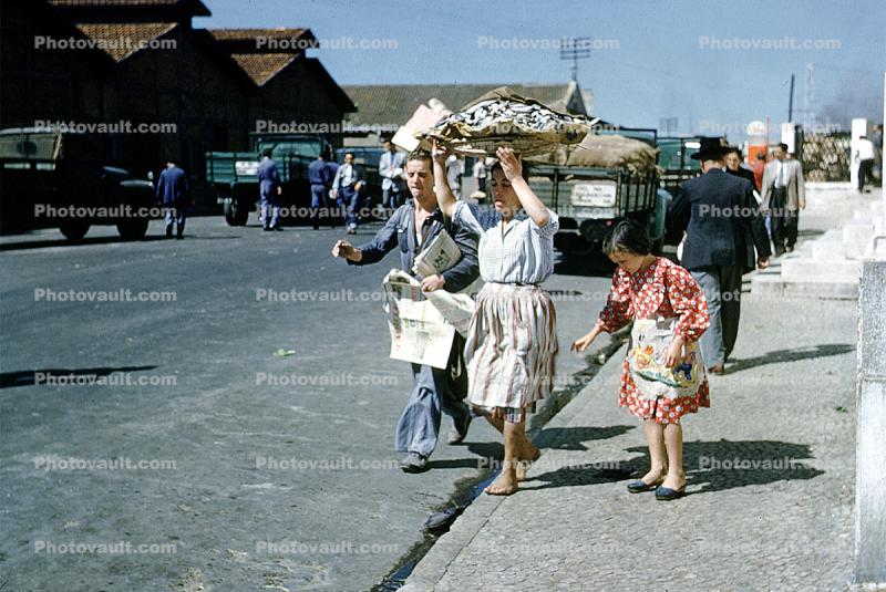 Woman, Buildings, sidewalk, 1950s