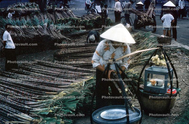 Bamboo Street Vendors, bananas, hat, Saigon, October 1962, 1960s