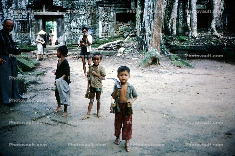 Boy Carrying things, Saigon, October 1962