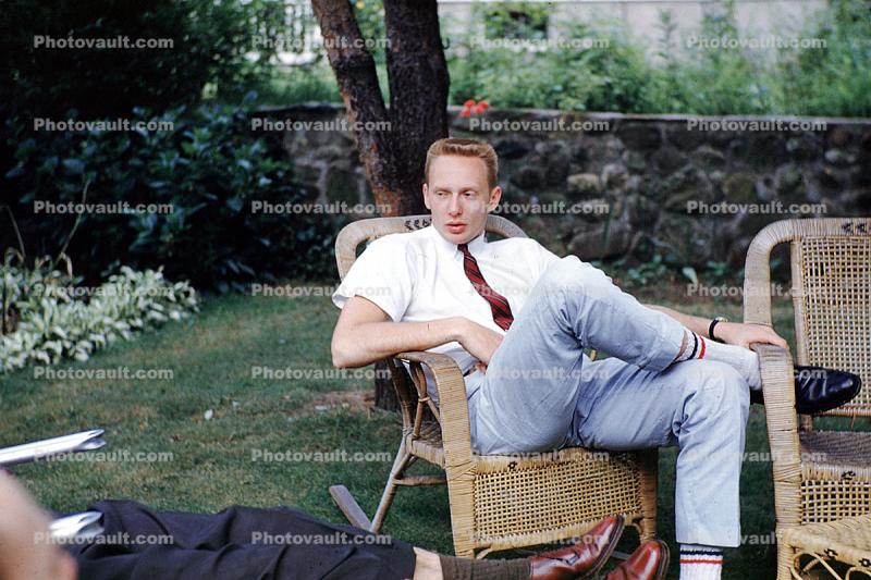Jim Ritchie, wicker chairs, man, male, backyard, pants, tie, flatop haircut, lawn, 1950s