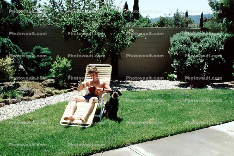 Backyard, Lounge Chair, rock garden, wall, man, male, reading, relaxing