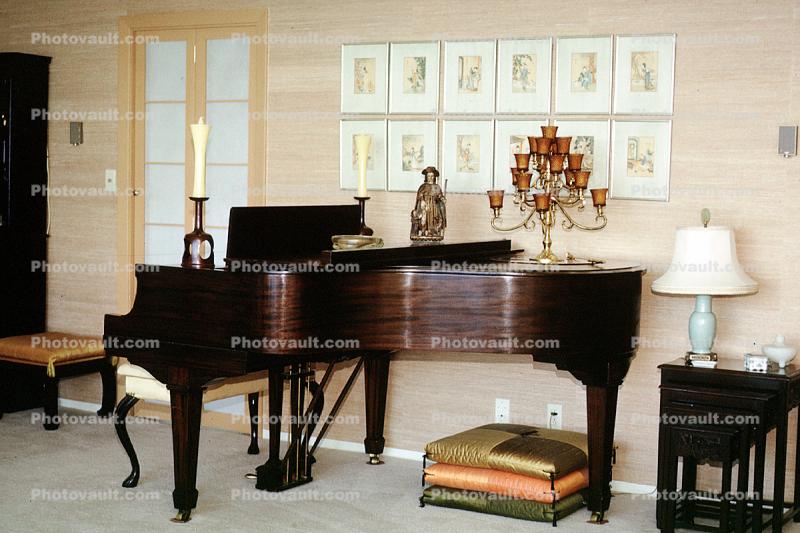 grand piano, musical Instrument, lamp, pillows, artwork, candle, pillows