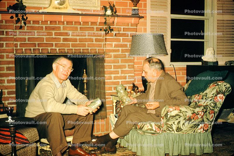 Men, Chair, sitting, fireplace, 1940s