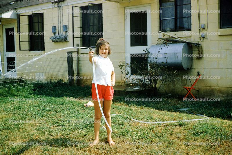 watering the garden, Backyard, 1950s