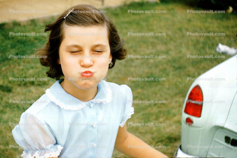 Girl making faces, 1950s