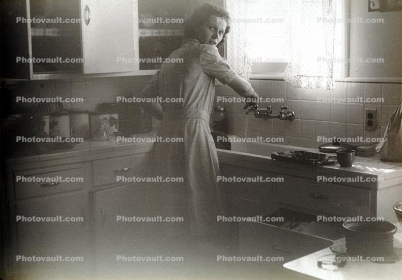 Woman in a Kitchen, Sink, 1940s