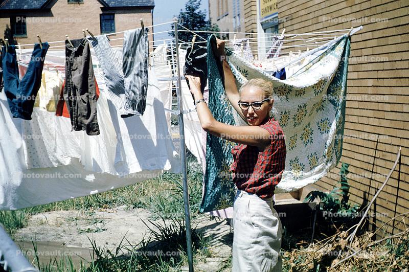 Hanging clothes, drying, sunny day, Clothes Line, Puerto Rico, 1950s