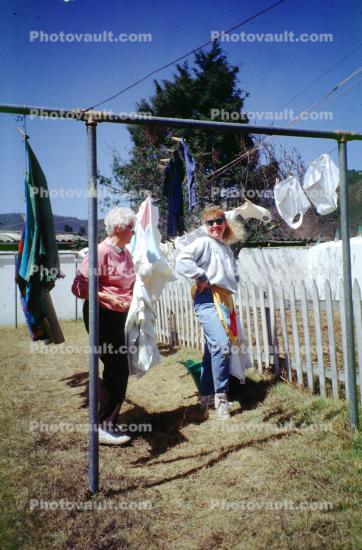 Women Hanging Clothes, bakcyard, drying, clothesline, Washingline