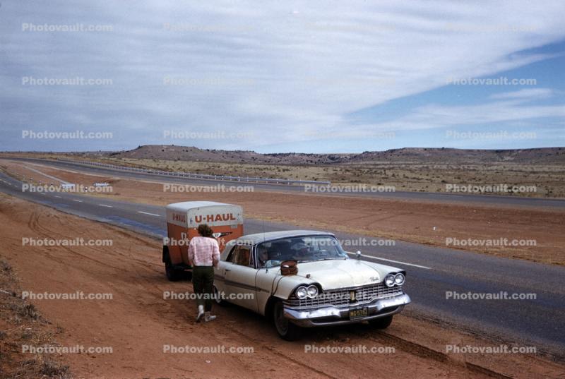 1959 Plymouth Sport Fury on Interstate I-40, U-Haul Trailer, 1950s