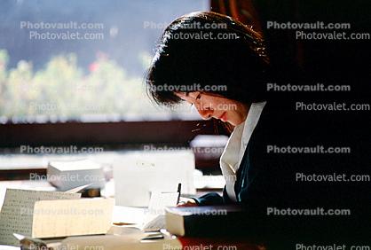 Woman, writing, desk