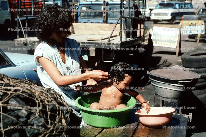 Boy, baby, washing, mother, son, San Salvador, El Salvador